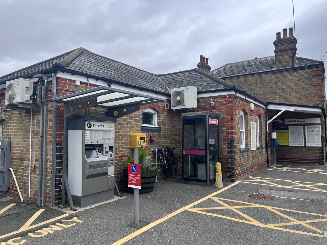 Hatfield Peverel train station external view featuring ticket machine and entrance