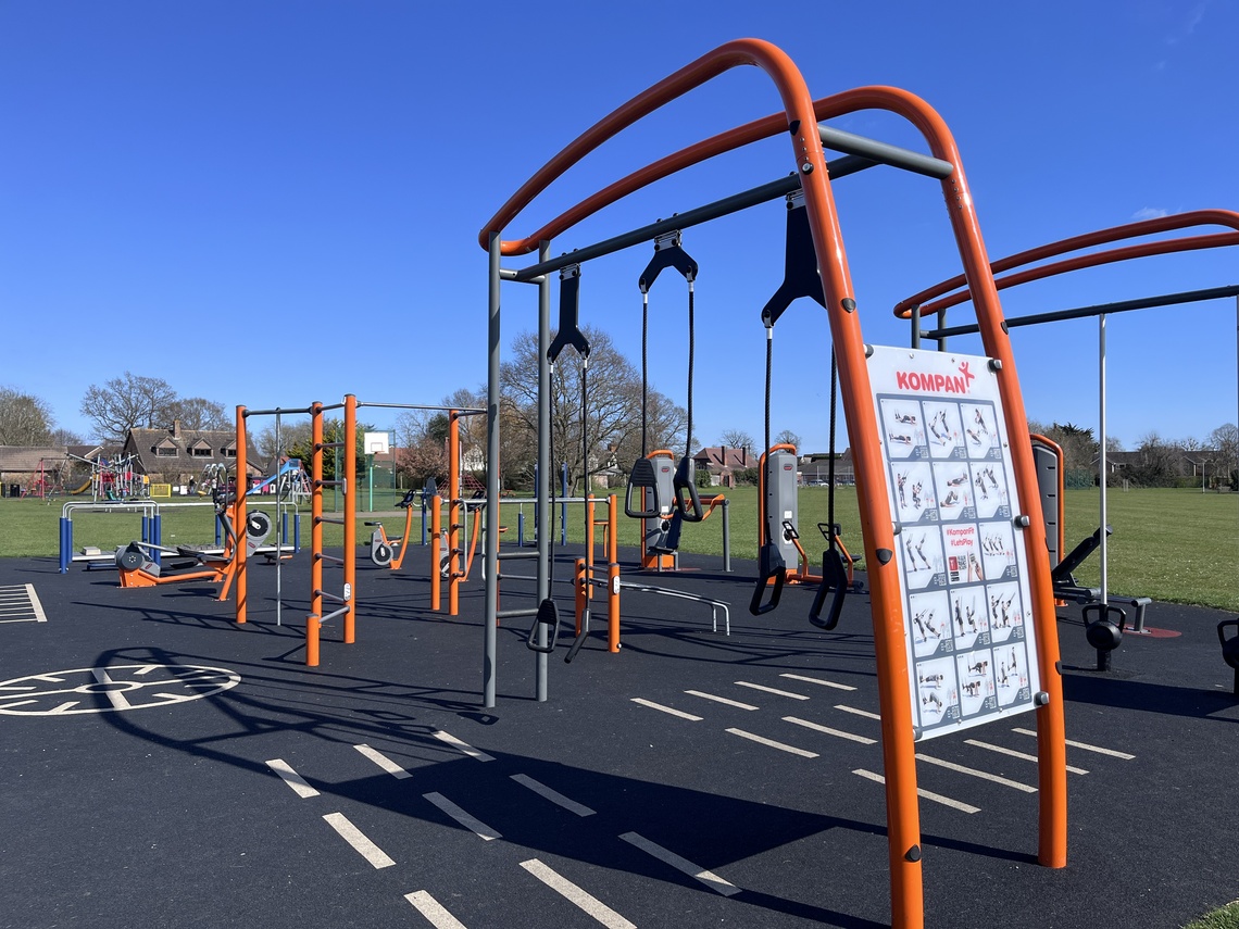 Outdoor gym equipment on a playing field