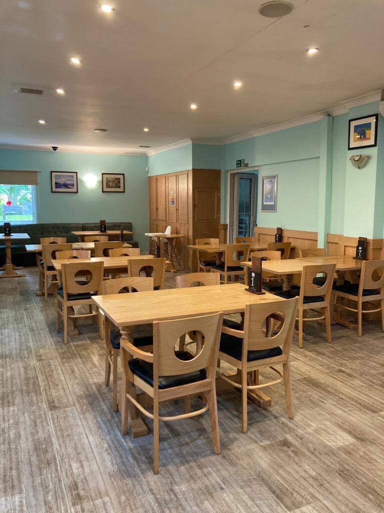 image of tables and chairs in coffee lounge